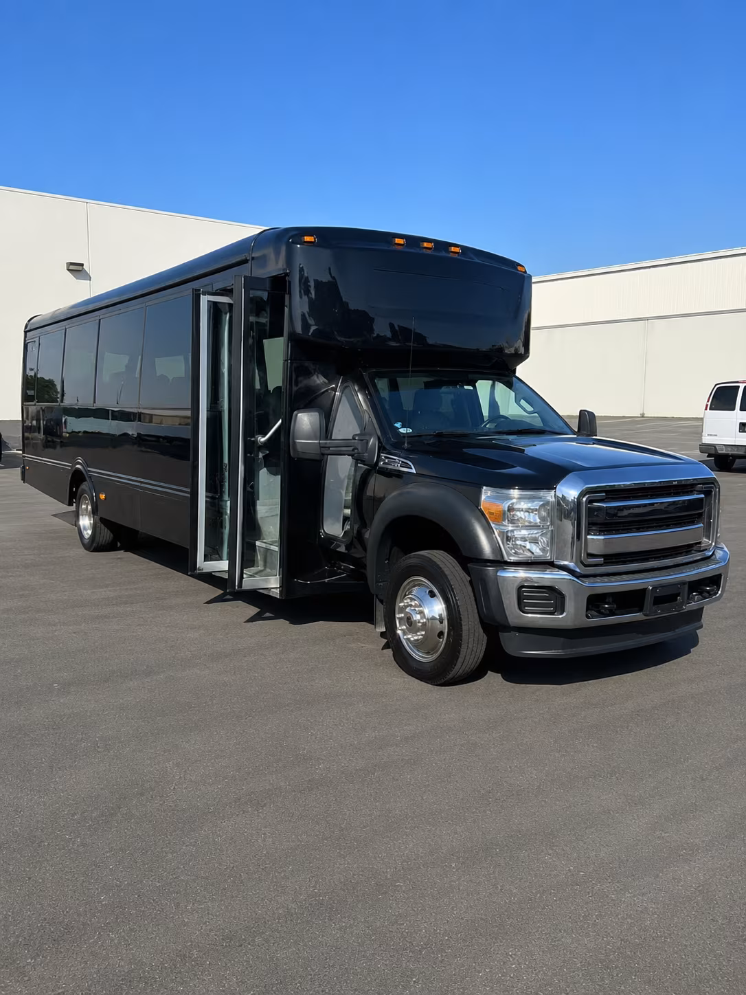 bus rentals for corporate moves between wyoming kentwood and grand rapids